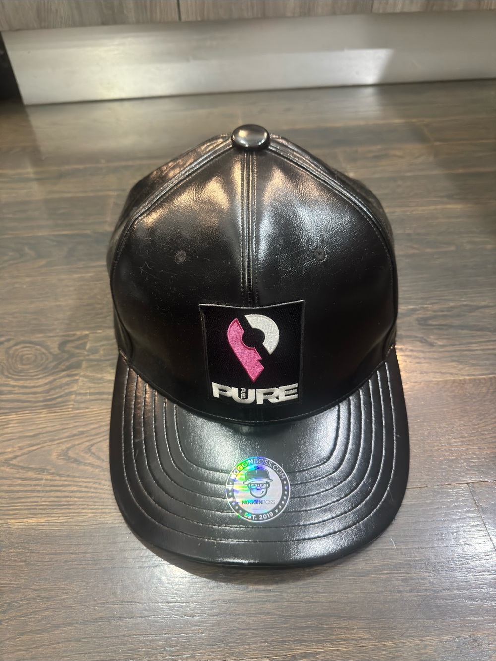 Noggin Boss Oversized PURE Leather-Look Black Snapback Hat with Pink Logo